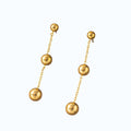 Aretes bolita.