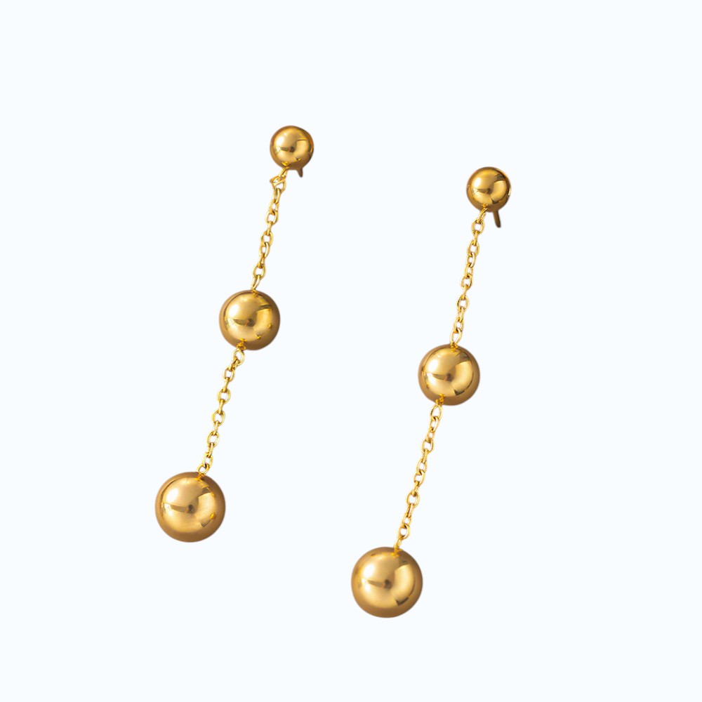 Aretes bolita.