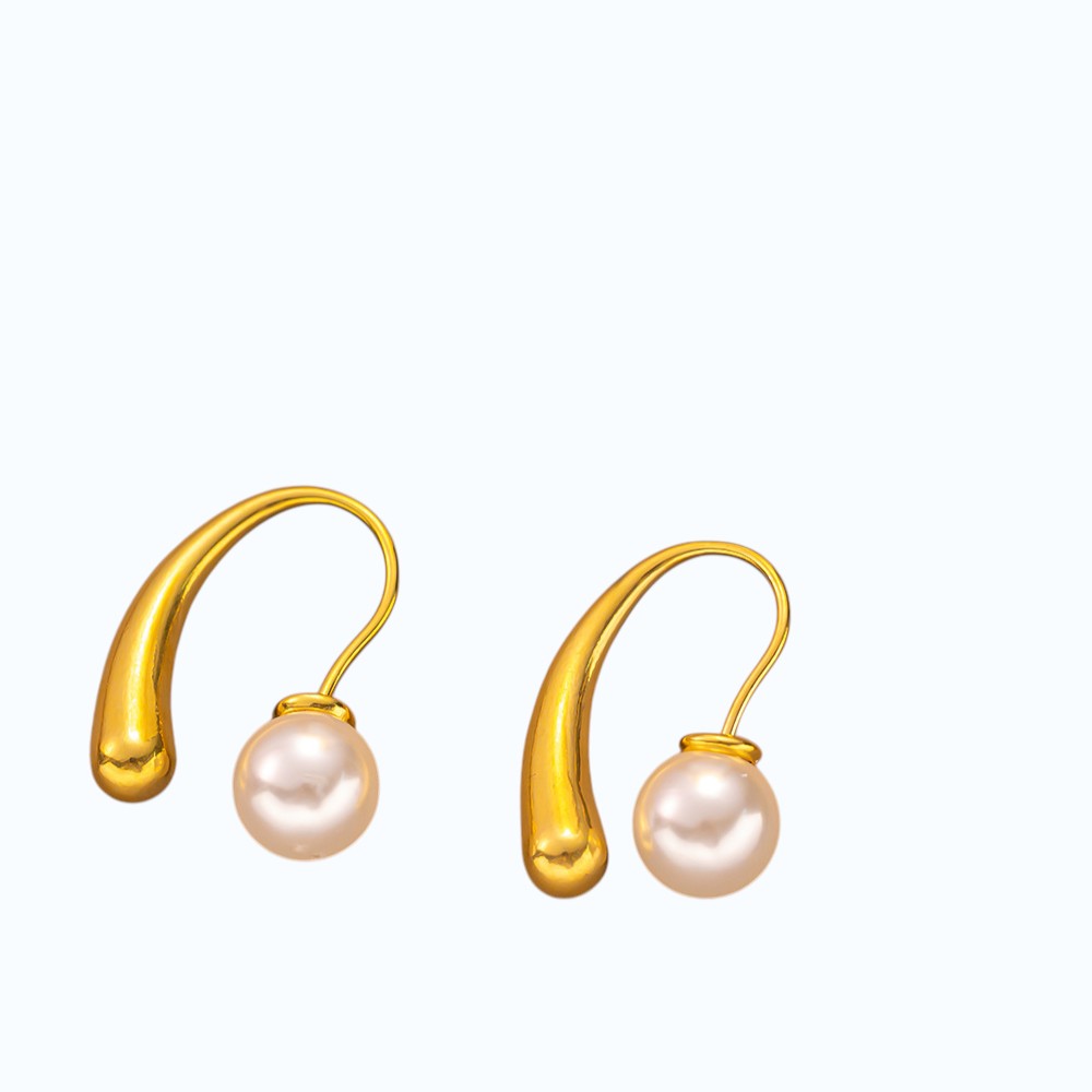 Aretes de gota de perla.