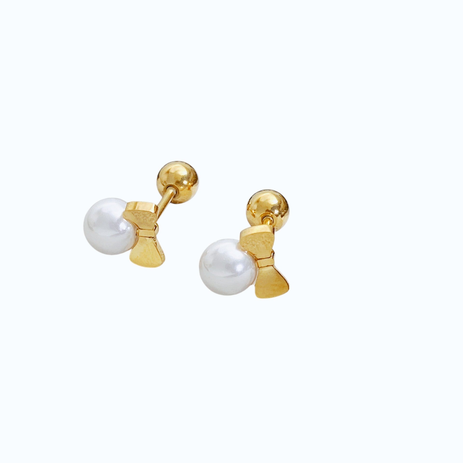 Aretes moñito.