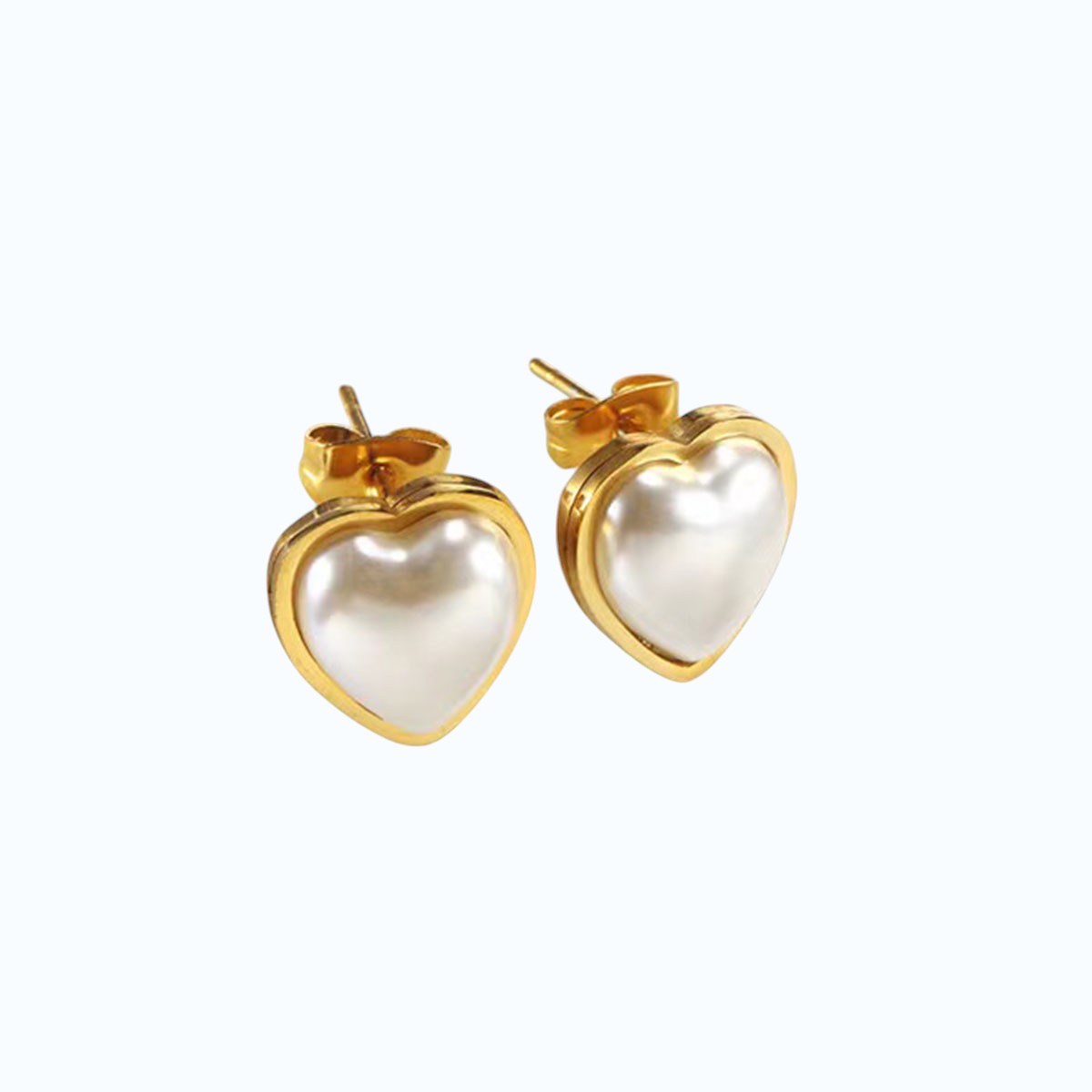 Aretes corazón de perla.