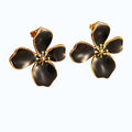 Aretes en forma de flor.
