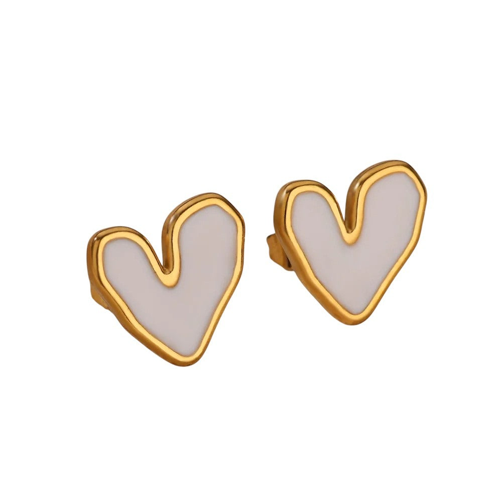 aretes de corazon blancos