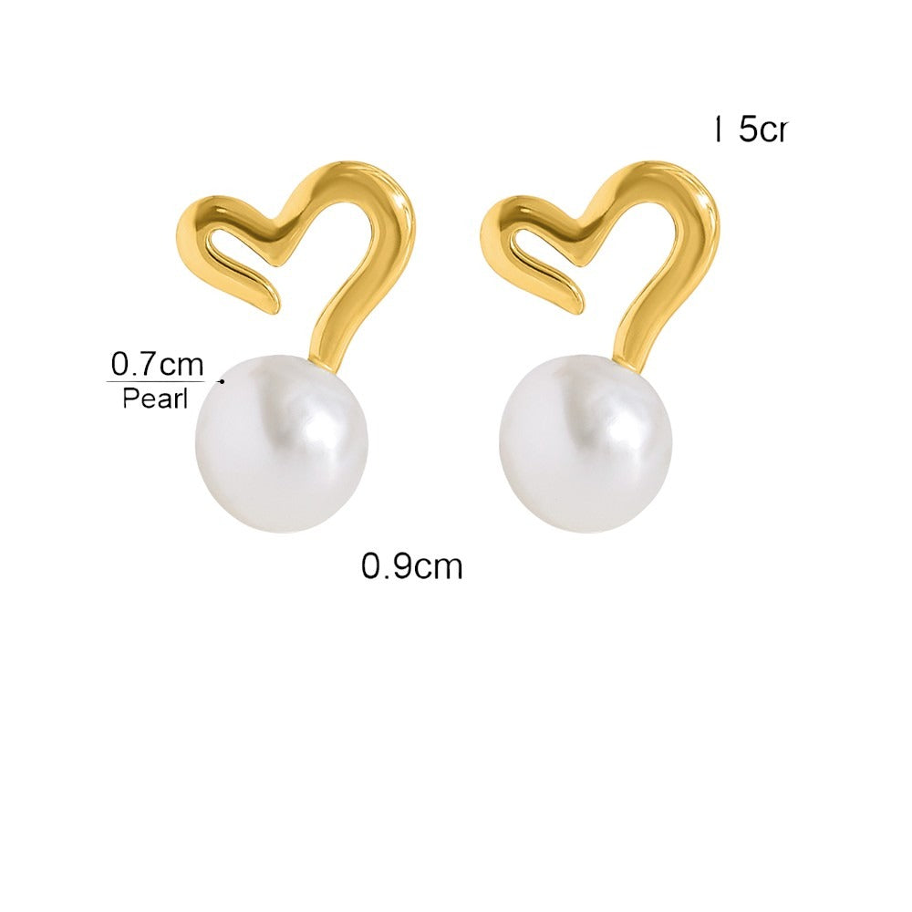 aretes de corazon con perlas