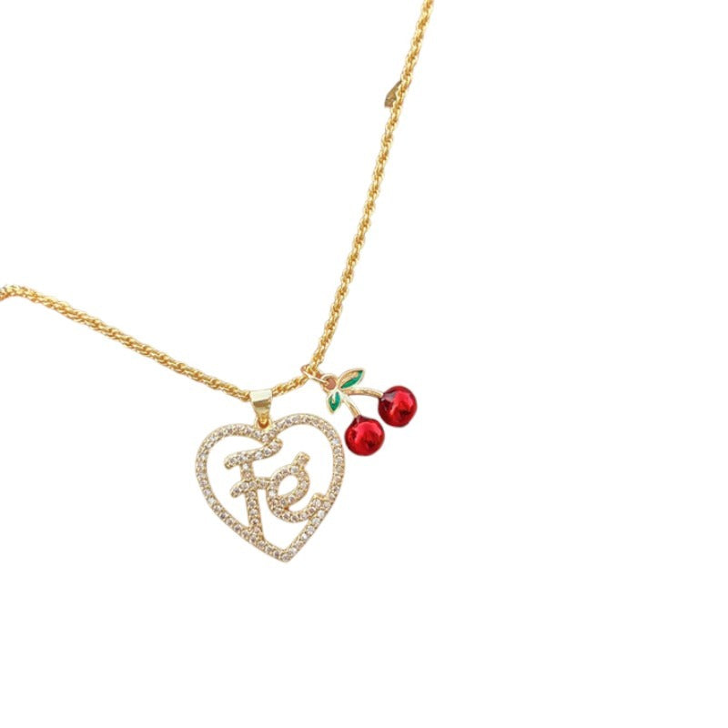 collar corazon de fe con cerezas