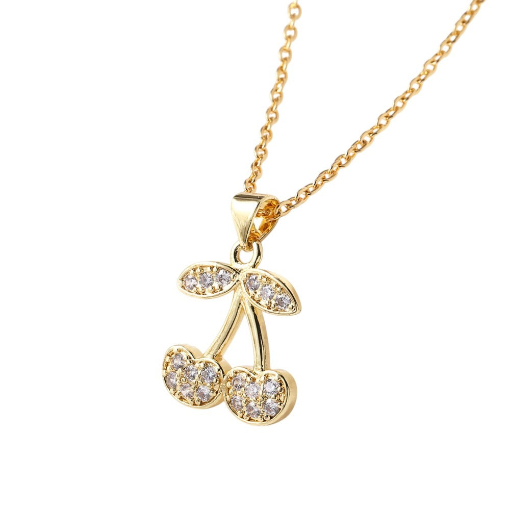 collar cerezas doradas